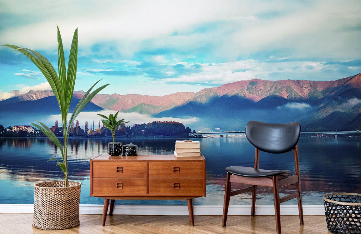 Tranquil Mountain Lake Mural in Blue Tones, mid-century furniture, wooden flooring, modern room decor.