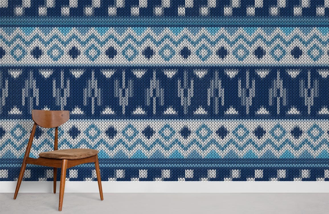 Navy and teal Nordic knit pattern wallpaper, cosy interiors with wooden chair and light flooring.