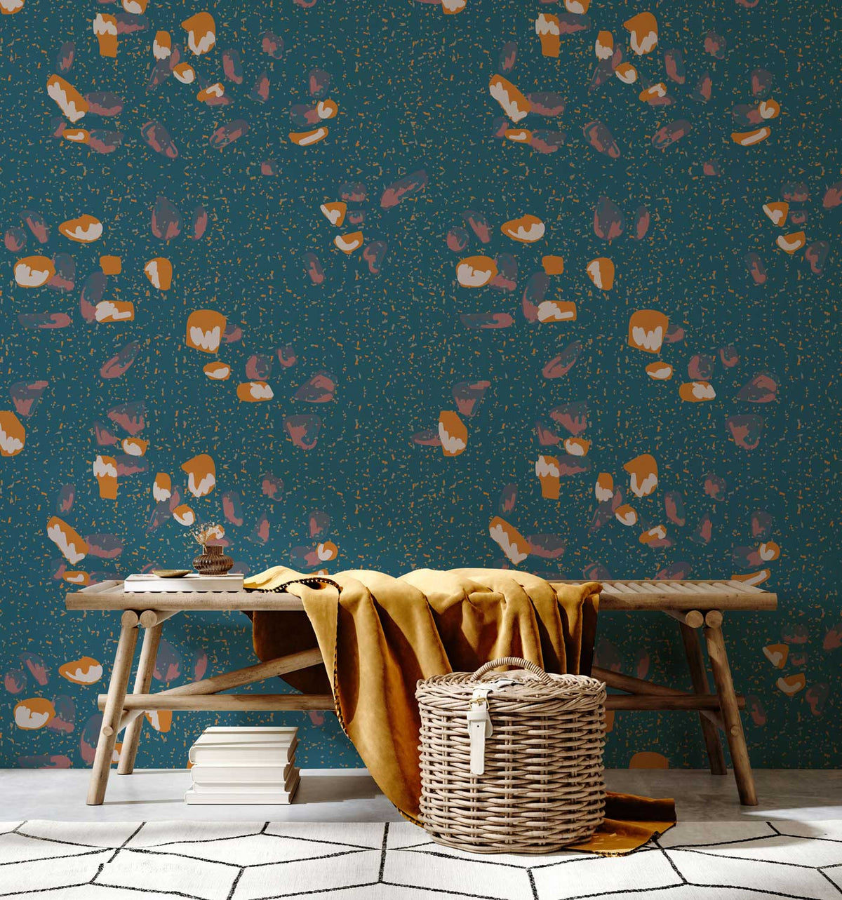 Teal and orange floral wallpaper, natural bench, bohemian interior, white geometric flooring, neutral basket.