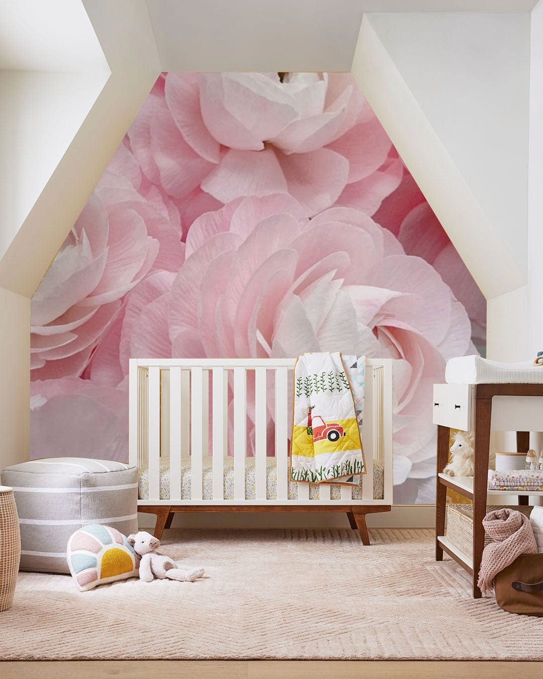 Blush Pink Ranunculus Wallpaper, elegant nursery with white crib, neutral carpet, soft pastel decor accents.