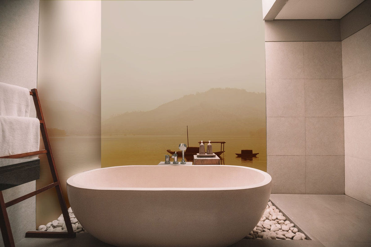 Modern bathroom featuring Tranquil Lake Mist Landscape Mural Wallpaper, freestanding bath, neutral tiles, calming decor.