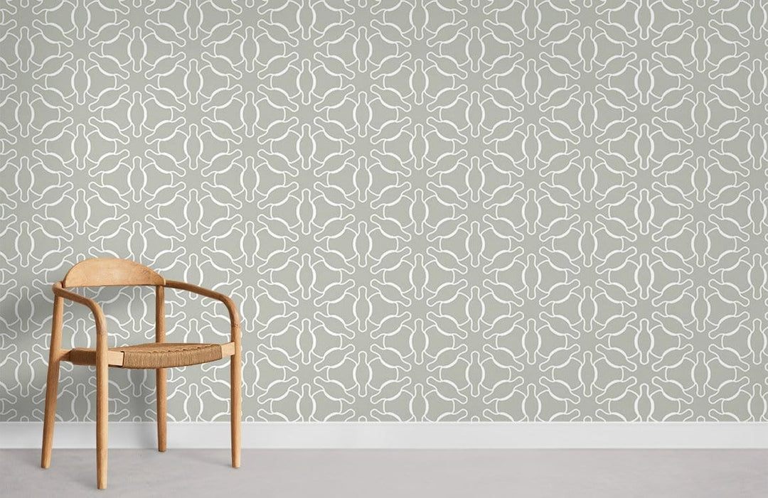 Elegant sage green abstract wallpaper with wooden chair, modern grey flooring in minimalist setting.