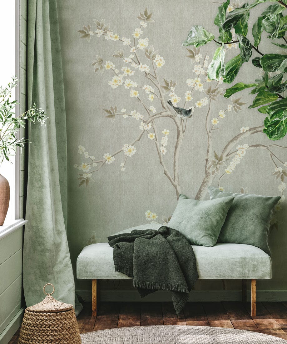 Elegant Blossom and Birds Taupe Chinoiserie Mural Wallpaper in vintage room with green sofa; wooden flooring.