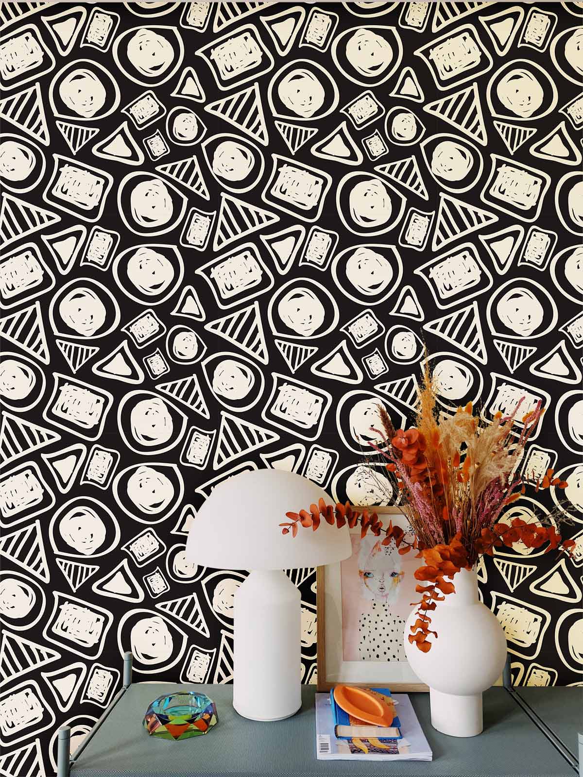 Monochrome geometric wallpaper in black and white, abstract art, featuring a modern decorative lamp and vase.