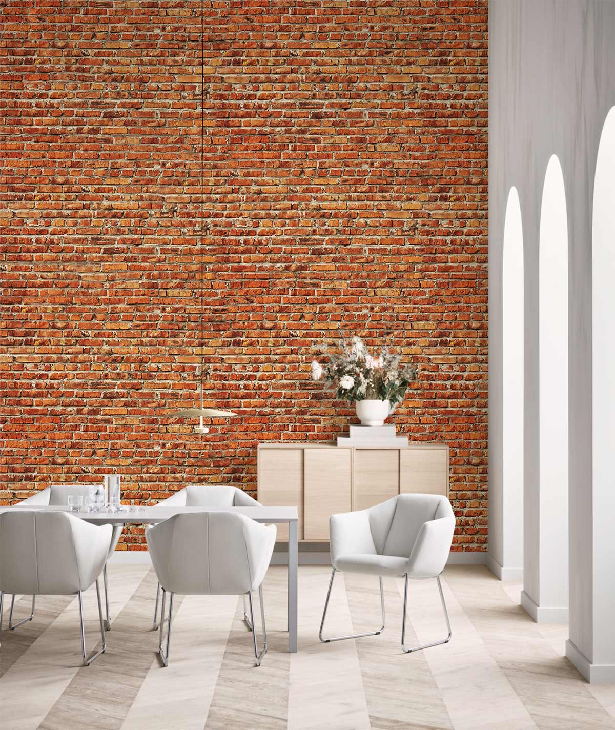 Vintage brick wall effect wallpaper in dining room with white chairs and light wood flooring.