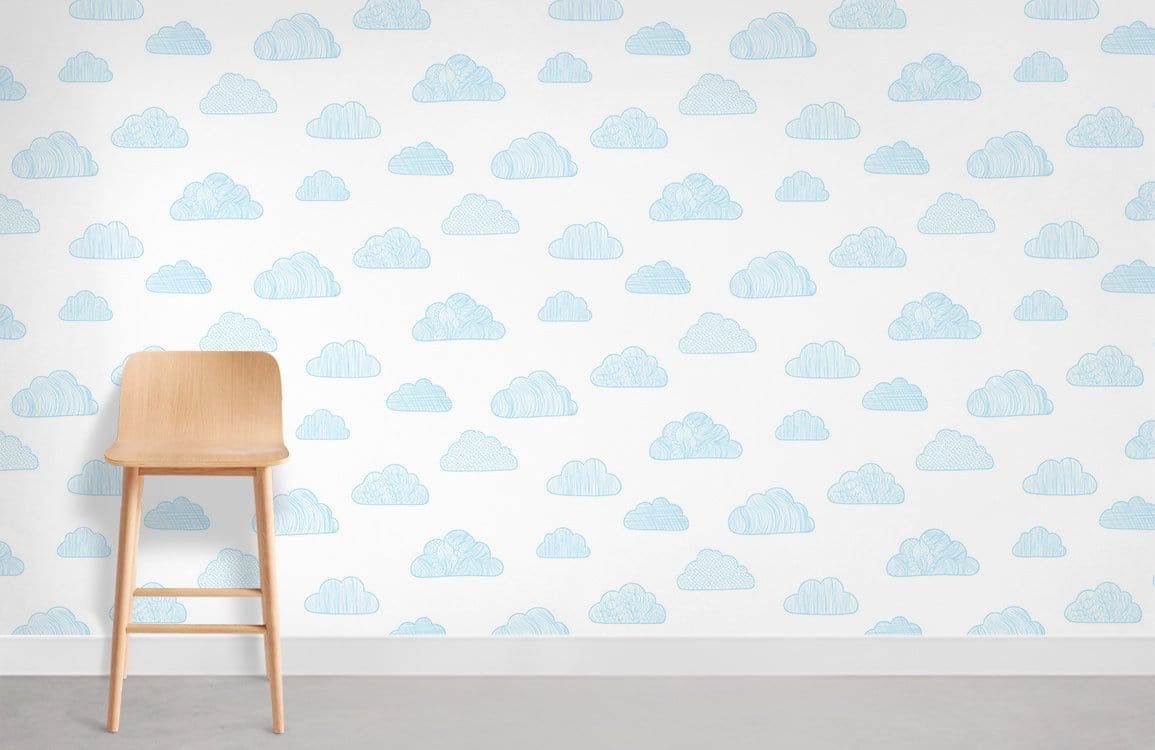 Dreamy Blue Cloud Pattern Wallpaper for nursery with light wooden chair and grey floor.