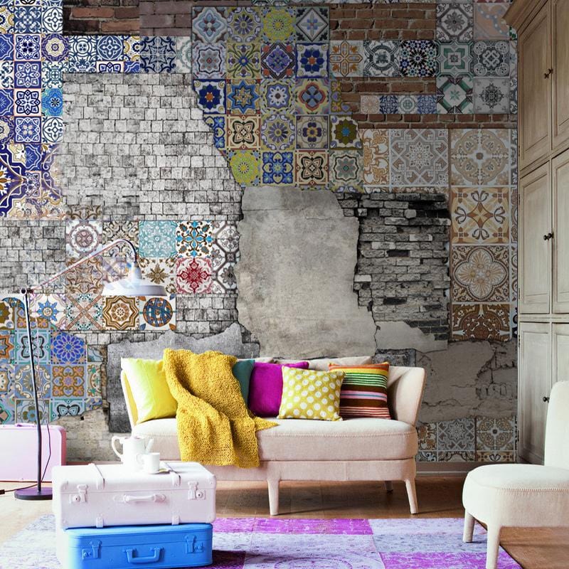 Vintage wallpaper with colourful geometric tile patterns, beige sofa, hardwood flooring, vibrant living room.