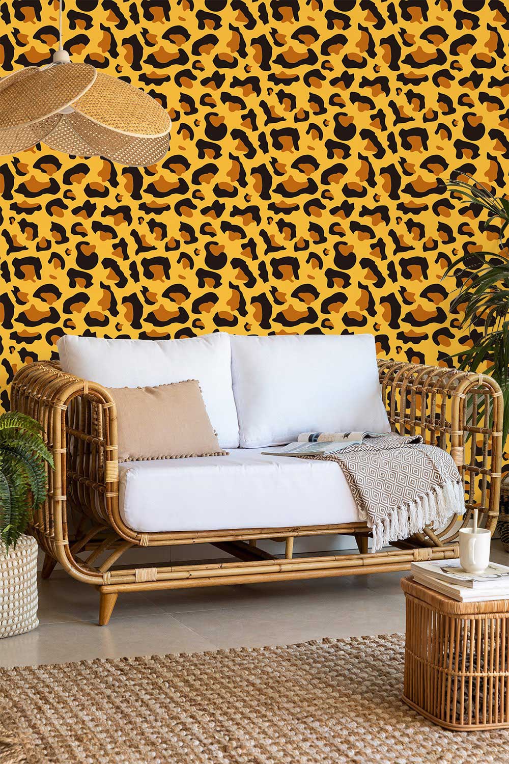 Leopard Print Wallpaper with golden and black design in living room, featuring wicker sofa and table.
