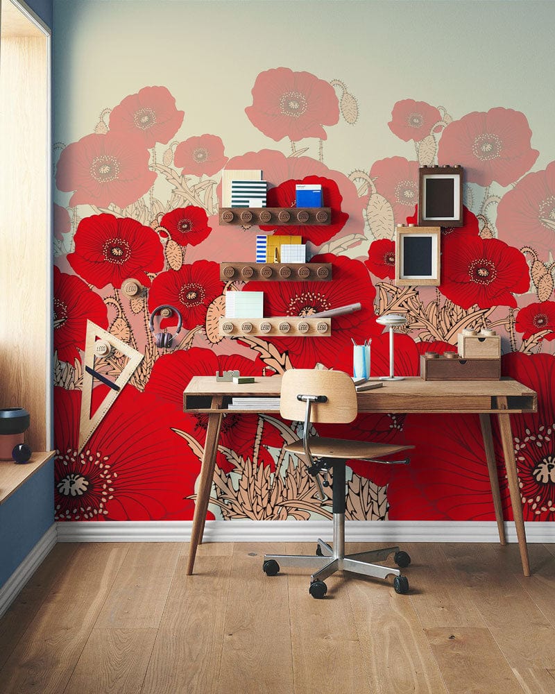 Red poppy field mural wallpaper with vibrant floral design, wooden desk, and modern office chair.