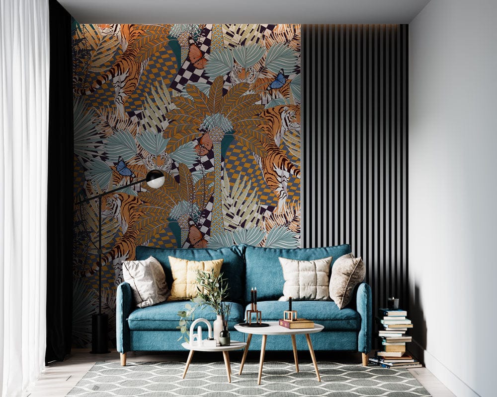 Tropical Safari Wallpaper in a living room with blue sofa, geometric rug, and sleek grey panelling.