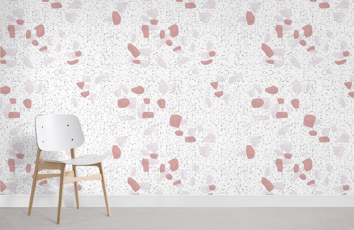 Elegant terrazzo pattern wallpaper, soft pink and white, with modern chair, minimalist room design.
