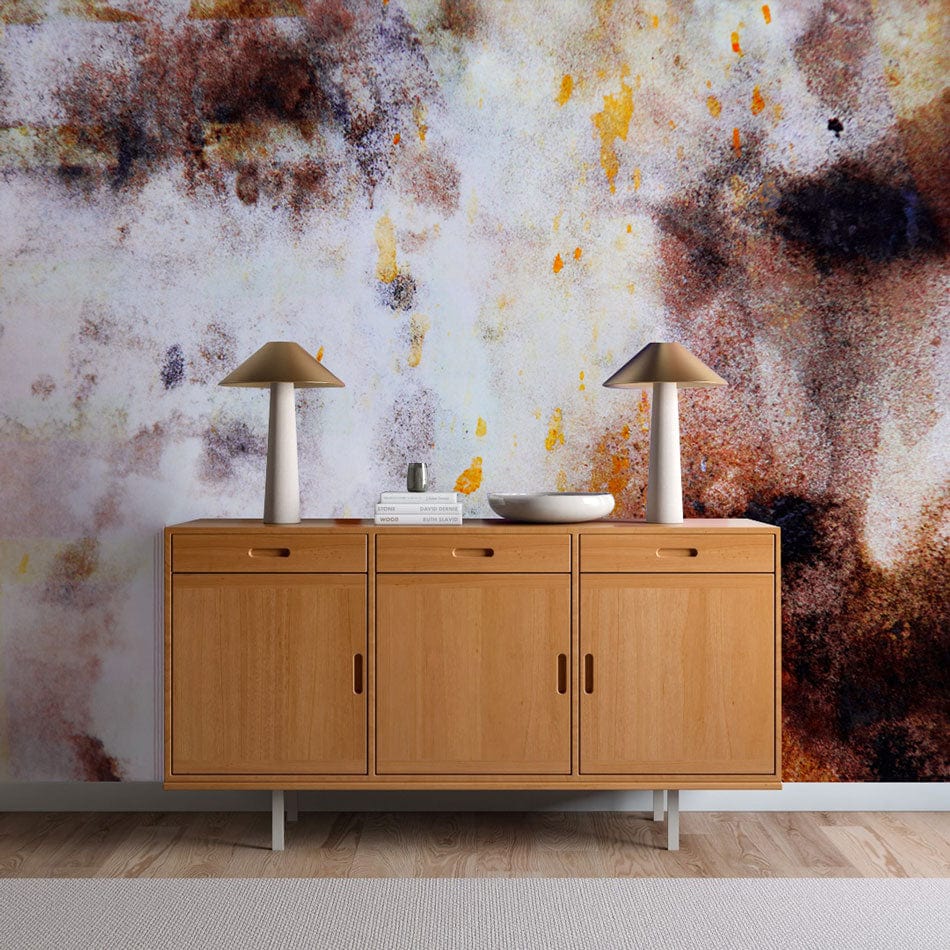 Abstract earthy tones mural wallpaper with wooden sideboard, lamps, in modern living room interior design.