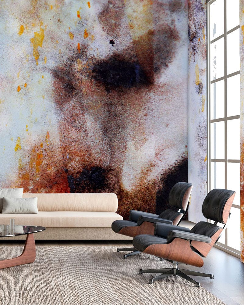 Abstract watercolour mural wallpaper in living room with beige sofa, modern chairs, and textured carpet.