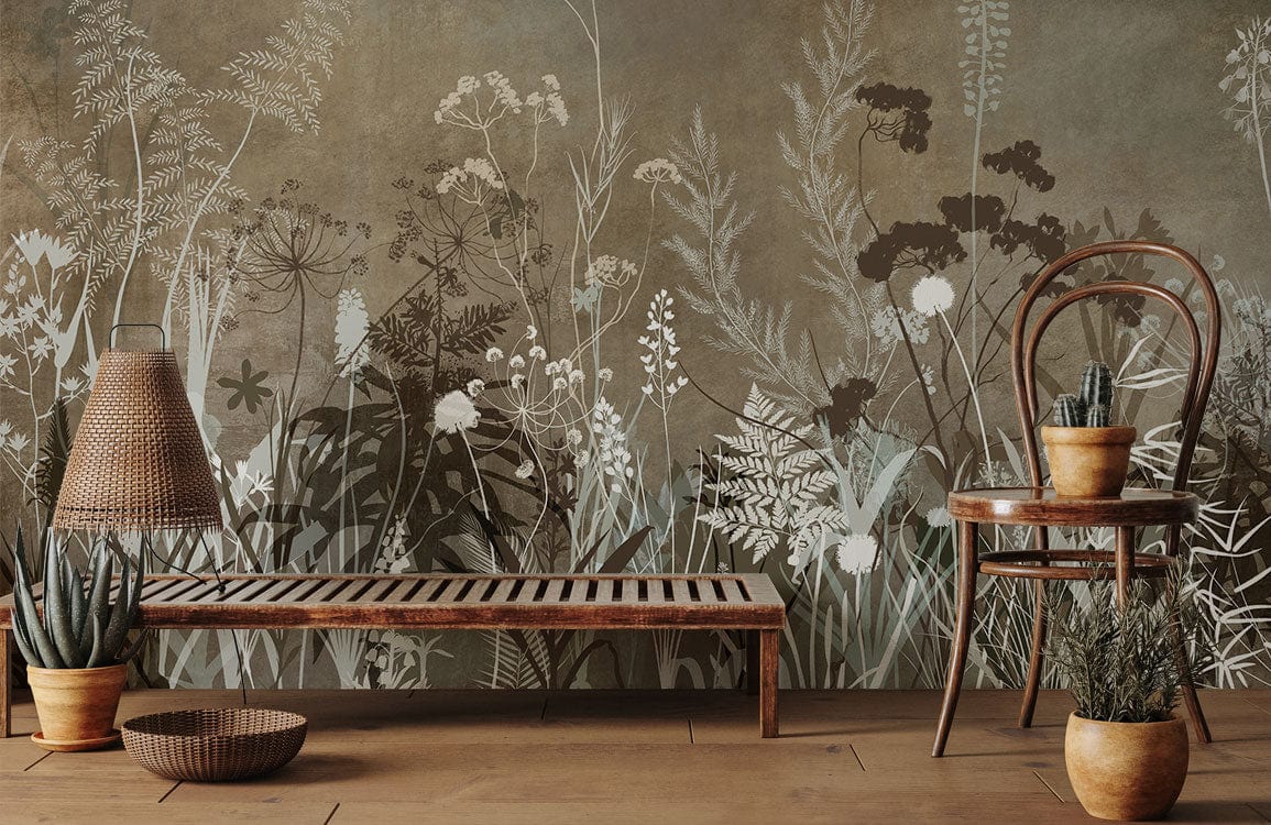 Vintage Botanical Meadow Mural Wallpaper in earthy tones enhances rustic room with wooden bench and chair.
