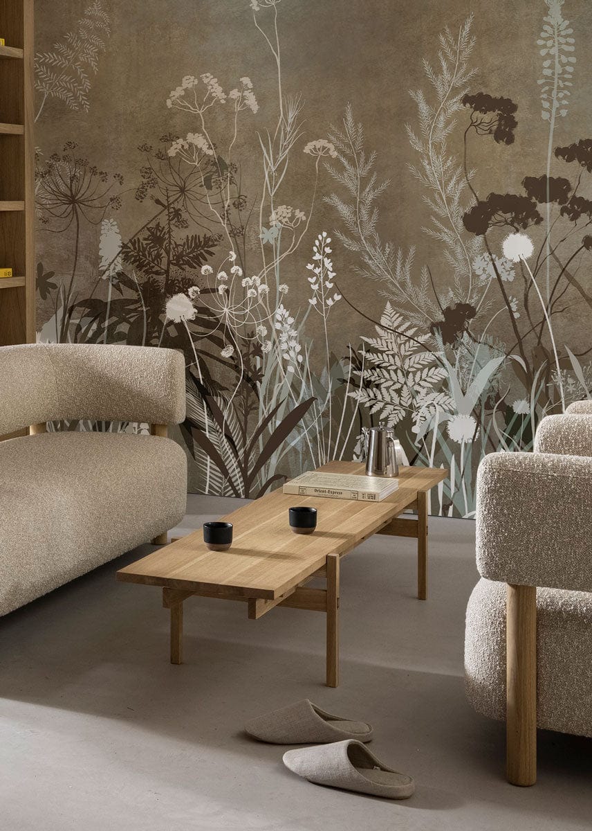 Vintage botanical mural in earthy tones complements rustic sofa and light wooden coffee table. Classic elegance.