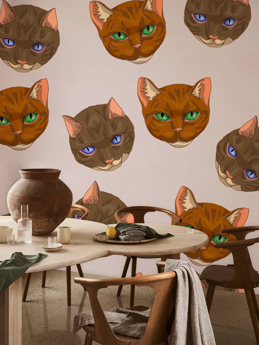 Charming cat wallpaper; brown and green cat faces, modern dining room, wooden table, neutral decor.