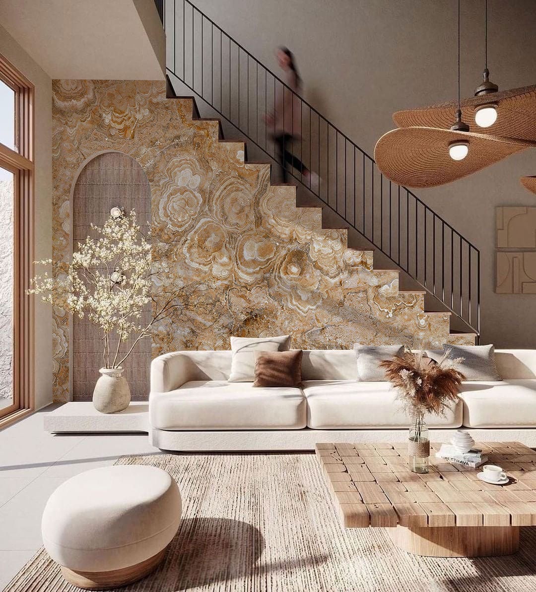 Elegant Beige Marble Effect Wallpaper in living room with beige sofa, textured rug, and wooden table.