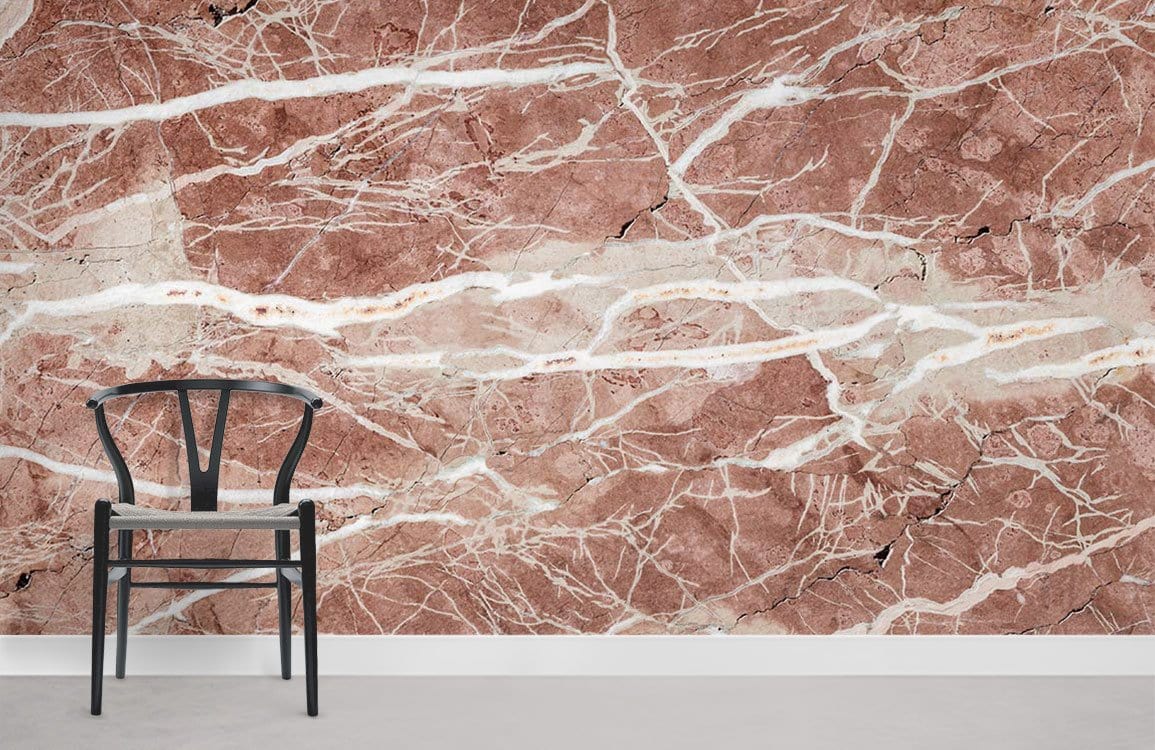 Elegant Rustic Pink Marble Texture Wallpaper with modern black chair, grey flooring, minimalist interior design.