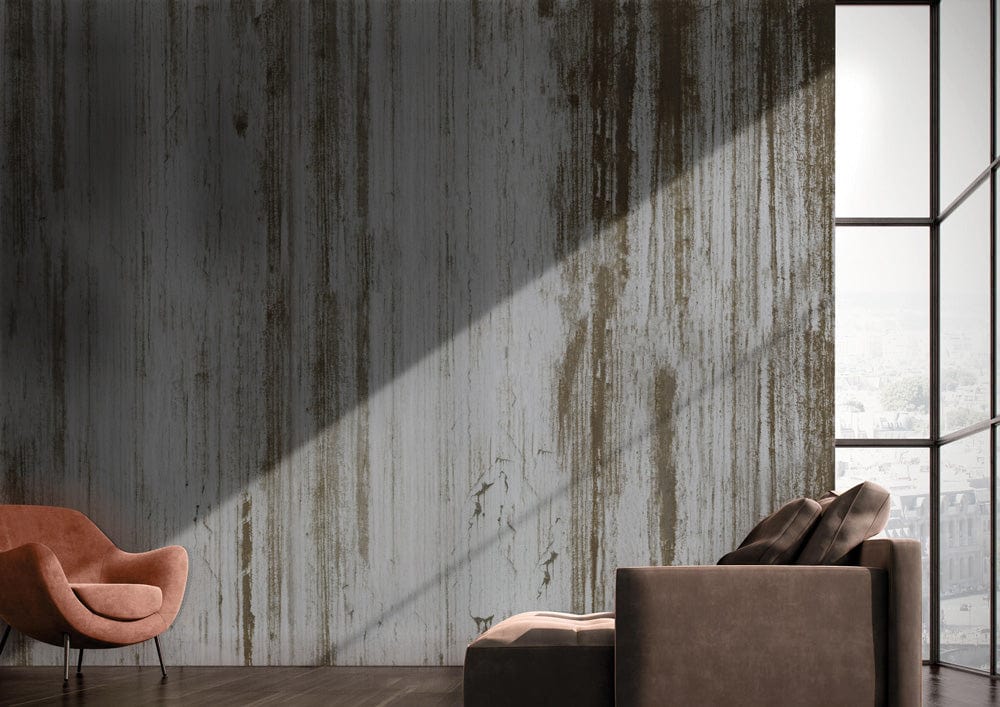 Industrial Chic wallpaper in rustic room with brown sofa, armchair, and large light-filled window.