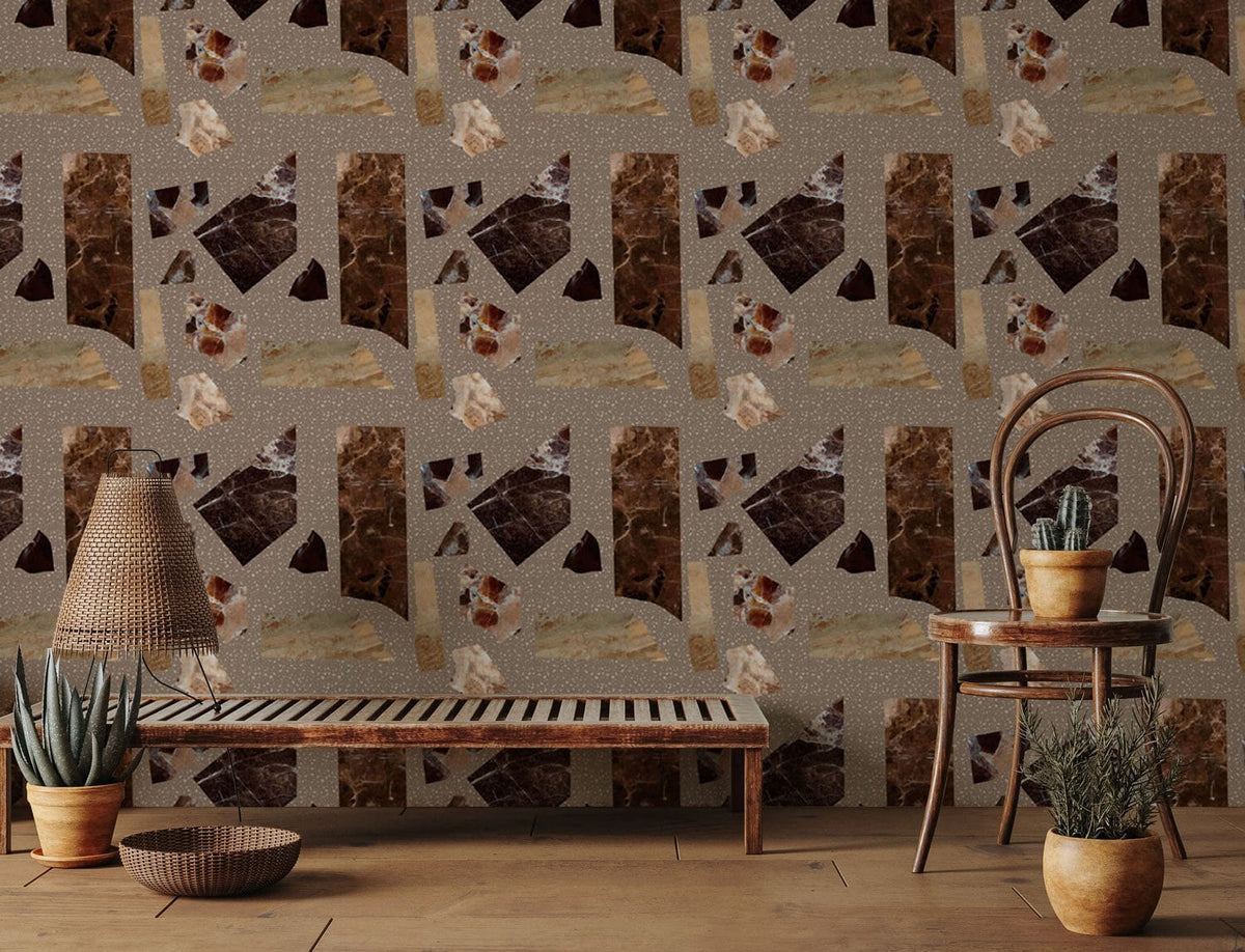 Rustic earth tones geometric wallpaper in living room with wooden bench, chair, and textured flooring.