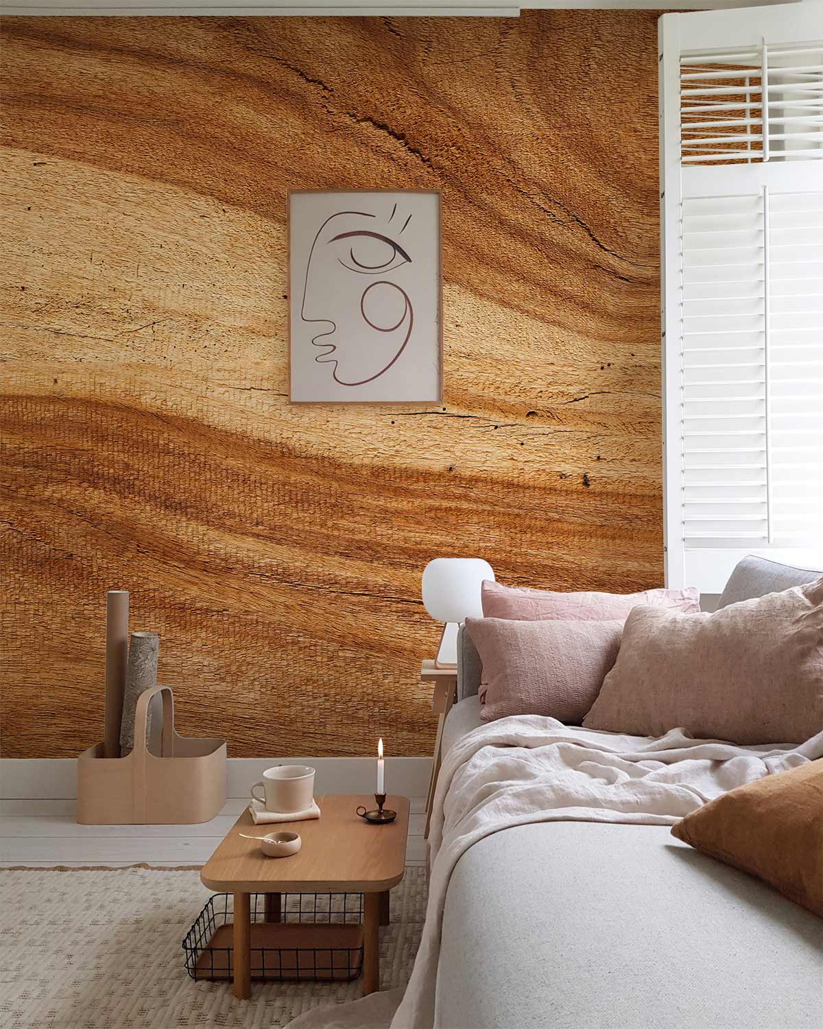 Modern living room with beige sofa, textured wood wall, minimalist artwork, and neutral decor elements.