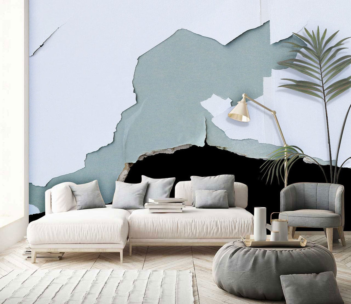 Vintage Distressed Blue White Wallpaper in Living Room with Modern Grey Sofa and Light Wood Flooring.