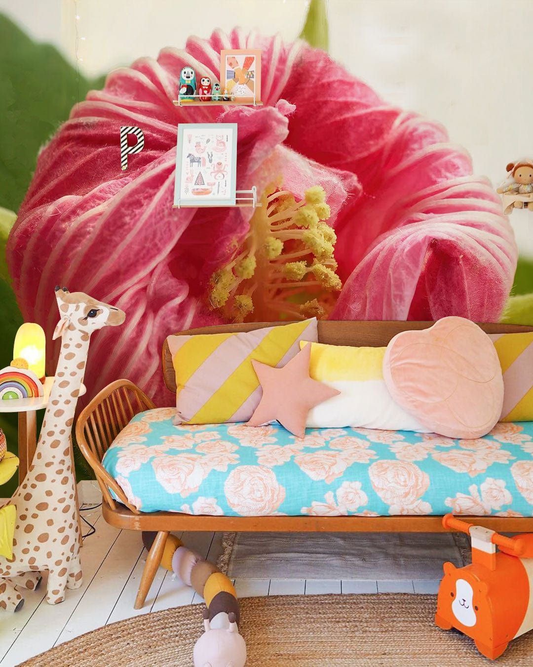 Blossoming pink hibiscus wallpaper in children's room, featuring colourful cushions and wooden cot.