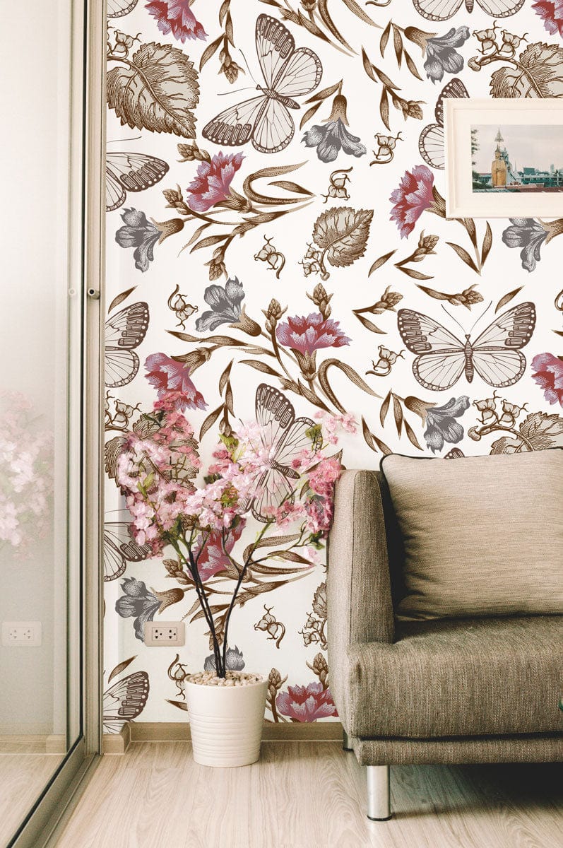 Elegant floral butterfly wallpaper, earthy tones, beige sofa, light wood flooring, living room, framed artwork.