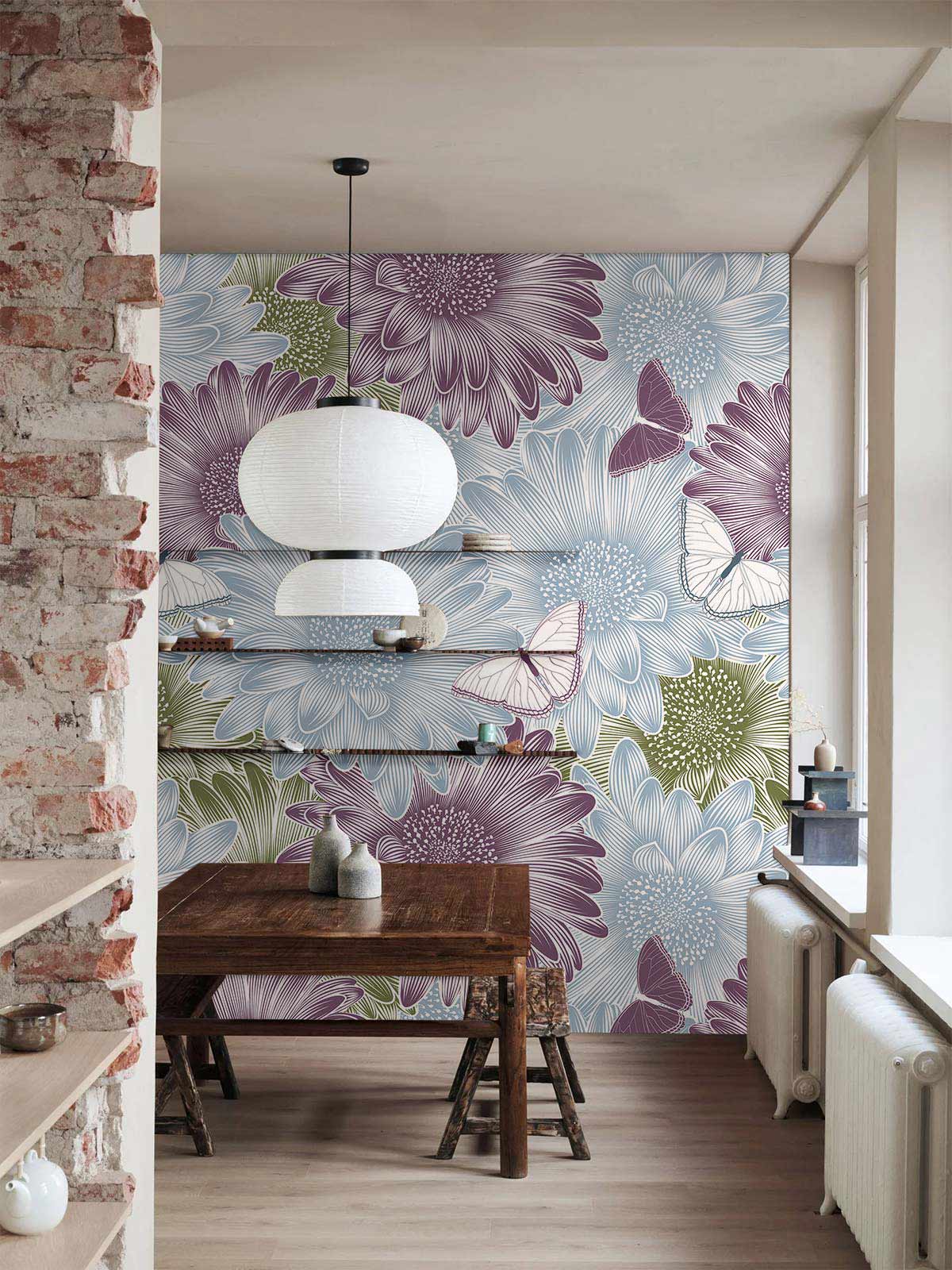 Vintage floral butterfly wallpaper in dining area with rustic wooden table, exposed brick, pendant light.