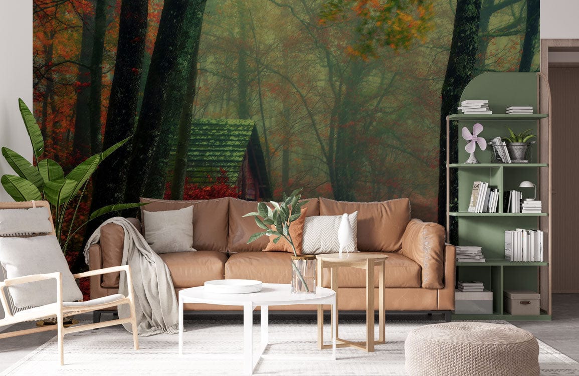 Enchanted Autumn mural in living room with tan sofa, green shelves, white tables, and light flooring.