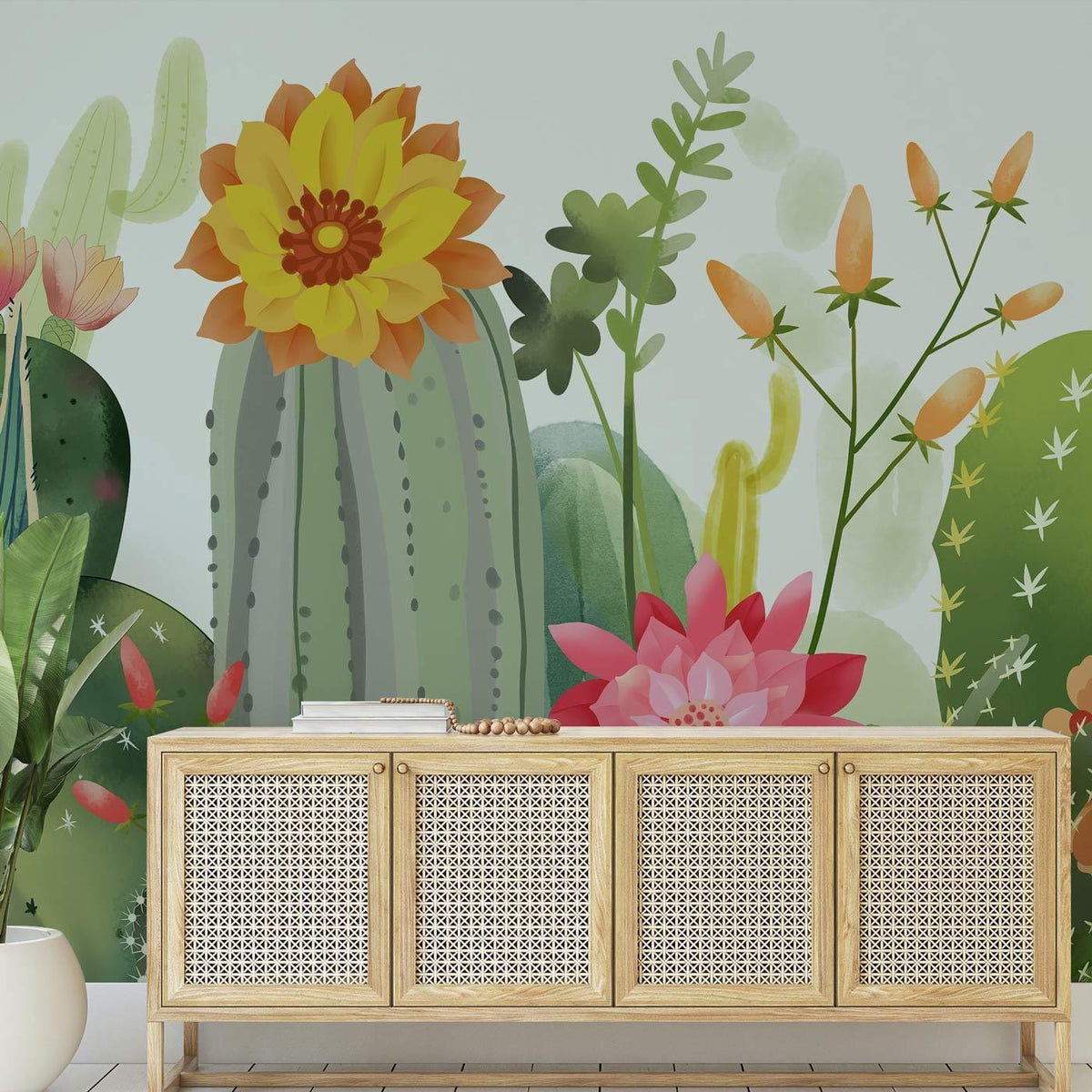 Vibrant floral cactus mural wallpaper, light wood cabinet, tropical decor, living room design enhancement.