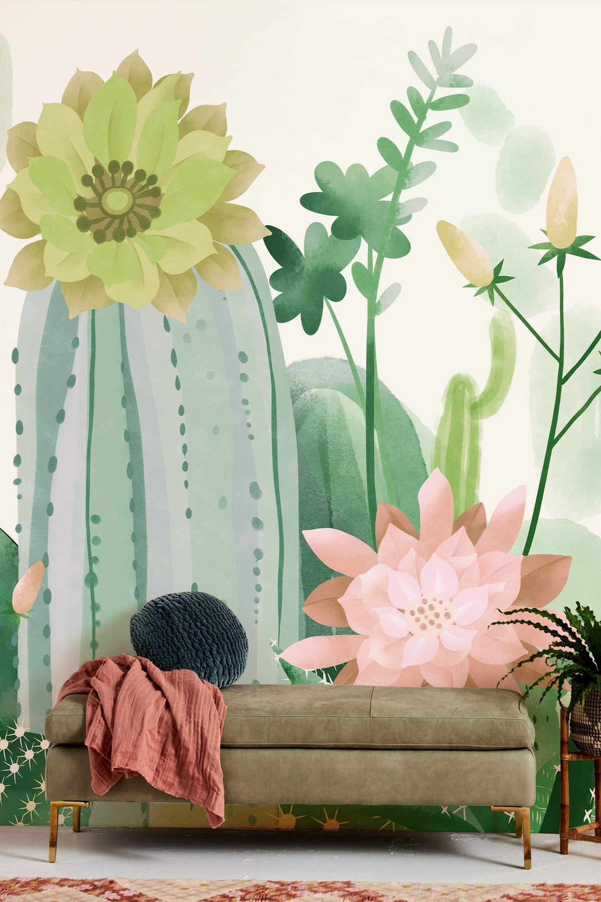 Watercolour cactus garden mural wallpaper with green velvet sofa, pastel hues, and hardwood flooring in lounge.