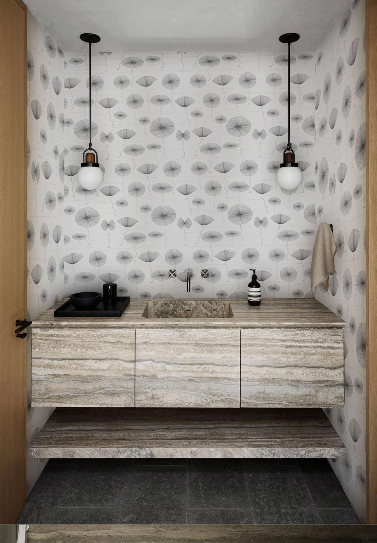 Minimalist grey abstract wallpaper decor with pendant lights, stone vanity, and grey tiled flooring in bathroom.