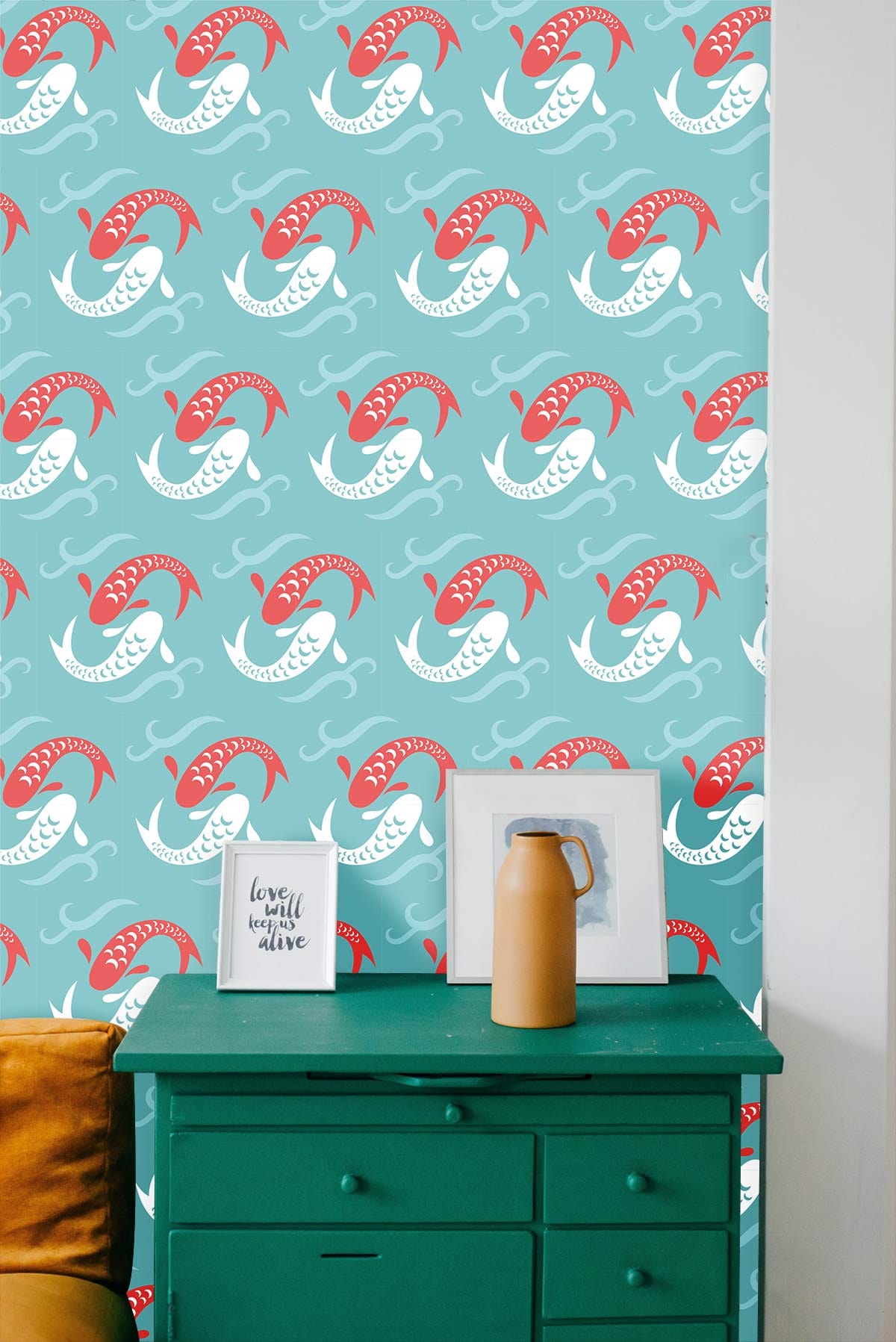 Aqua and Coral Vintage Fan Pattern Wallpaper with Green Dresser in Elegant Interior Room Setting.