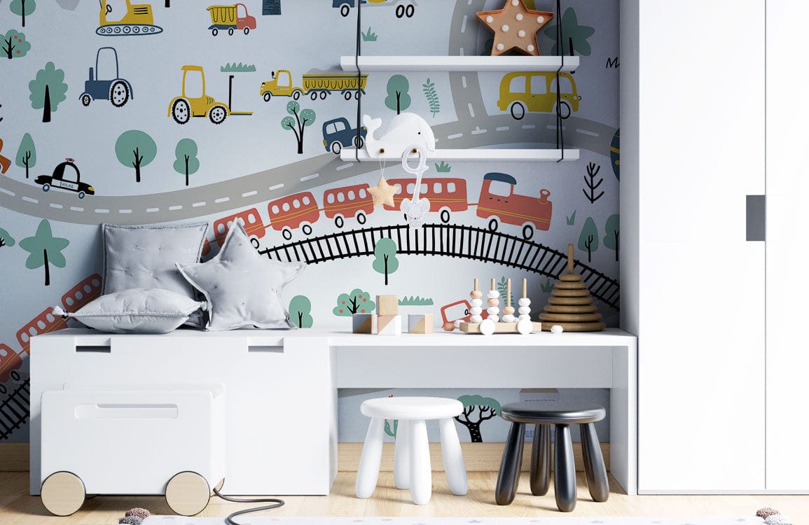 Colourful City Adventure Wallpaper in child's room with playful roads, vehicles, white furniture, wooden flooring.