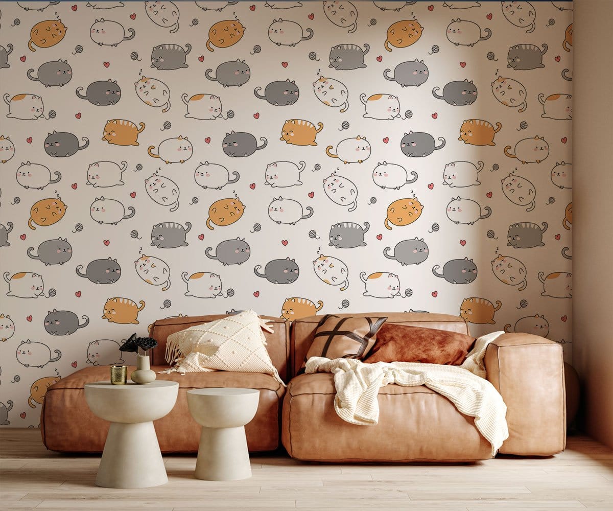 Charming cartoon cats wallpaper in grey, orange, white; neutral sofa; light wood flooring in living room.