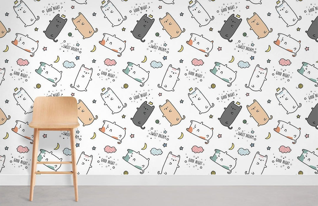 Children's room with pastel cat wallpaper, wooden chair, and grey floor, ideal for playful decor.
