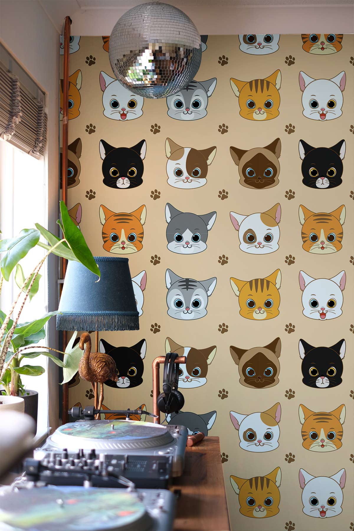Charming Cartoon Cat Faces wallpaper, soft brown tones, retro turntable, disco ball, cosy living room.