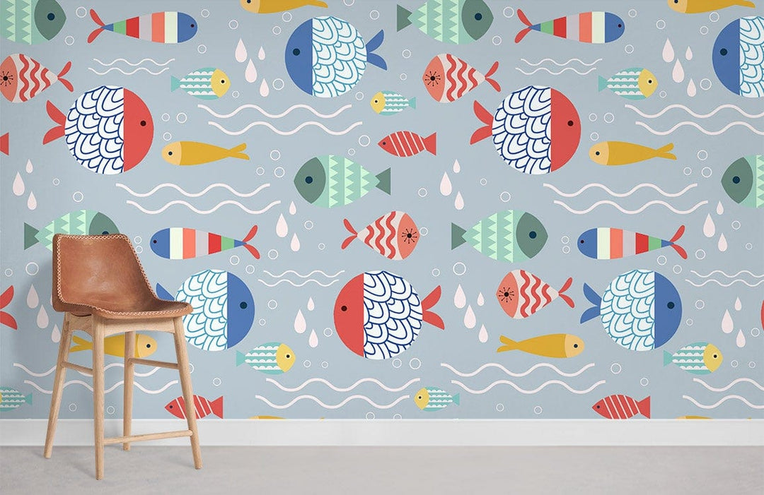 Playful underwater fish pattern wallpaper with coastal colours, brown chair, light flooring. Room decor.