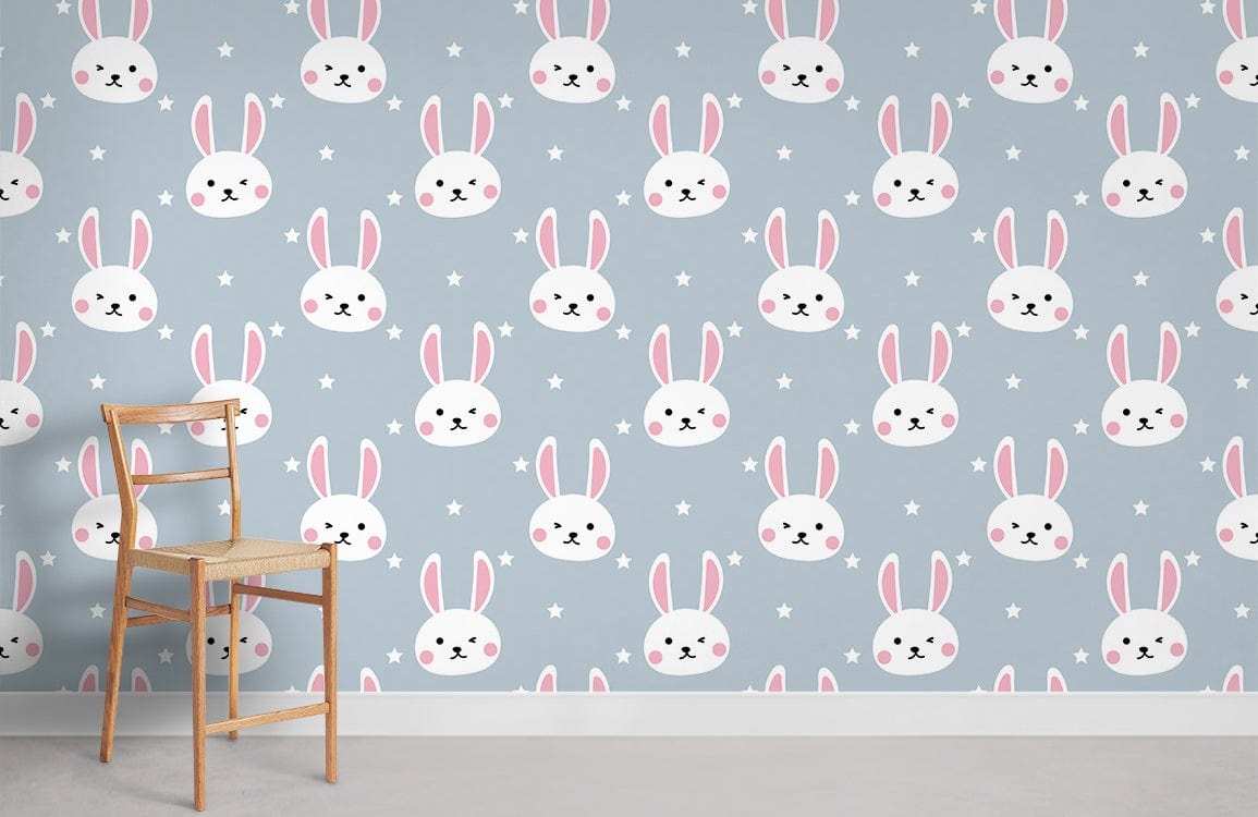 Whimsical Bunny Patterned Wallpaper in Pastel Blue for Nurseries, wooden chair, light flooring.