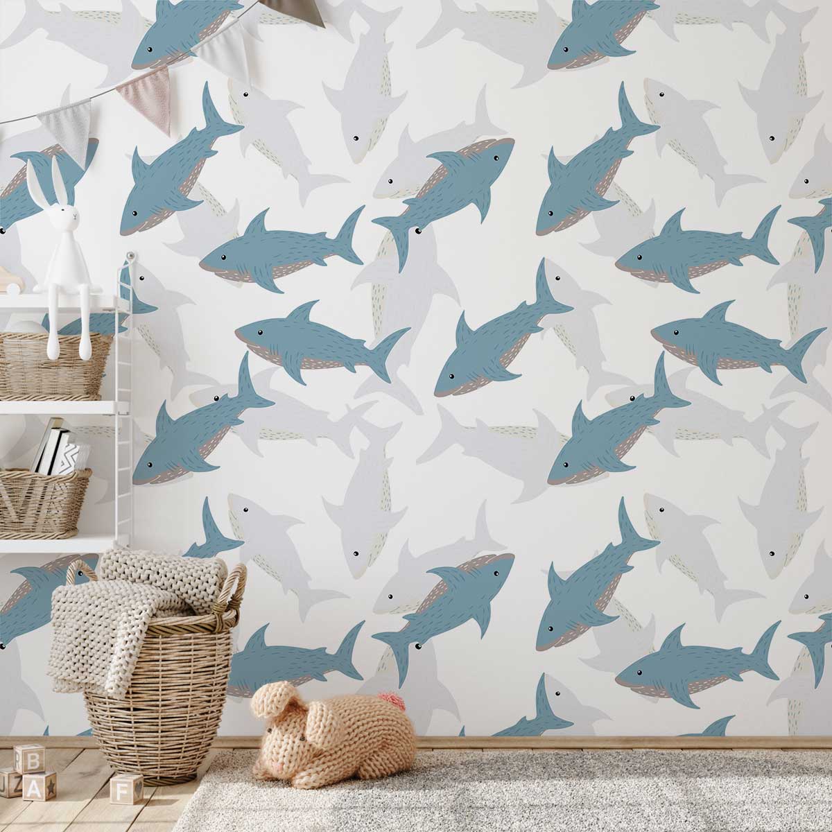 Alt text: Blue Ocean Shark Wallpaper with wicker basket, shelving, and wooden flooring in children's playroom.