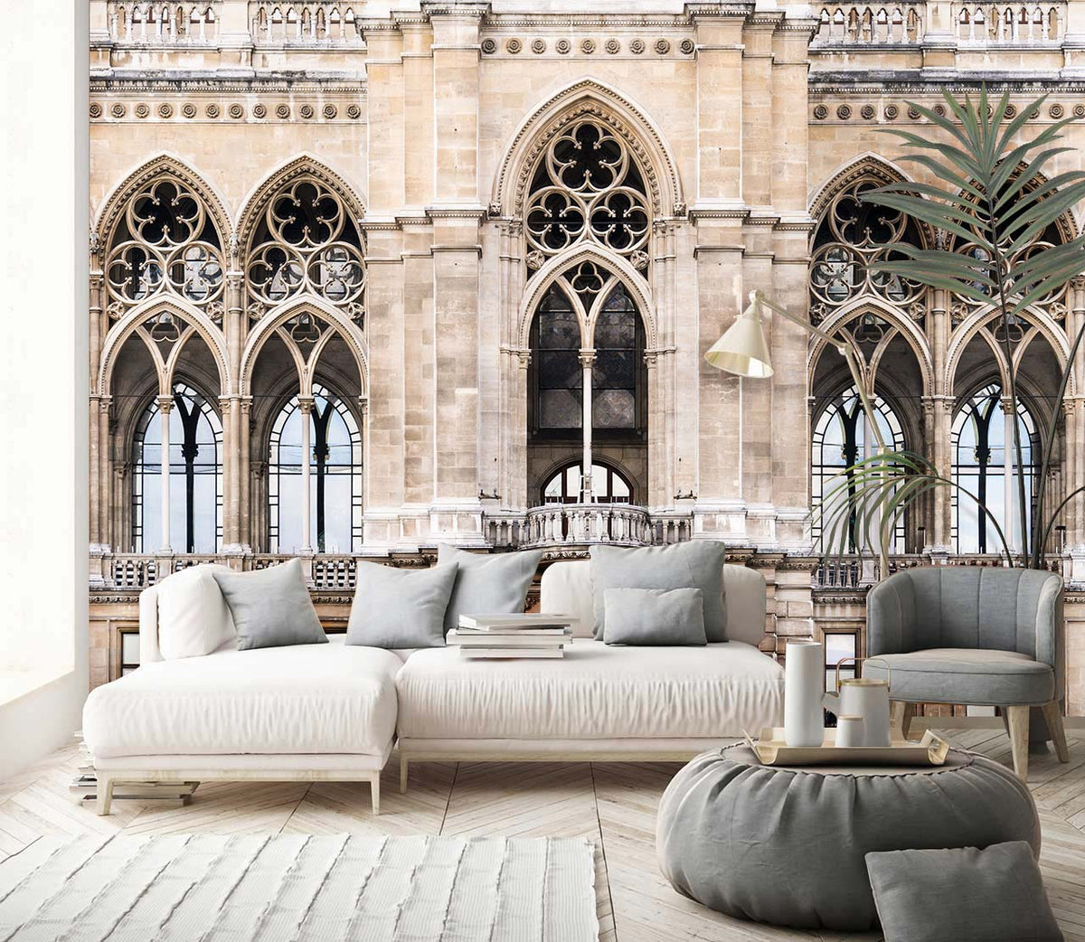 Elegant Gothic architecture mural wallpaper, beige stone, white sectional sofa, grey armchair, wooden flooring lounge.
