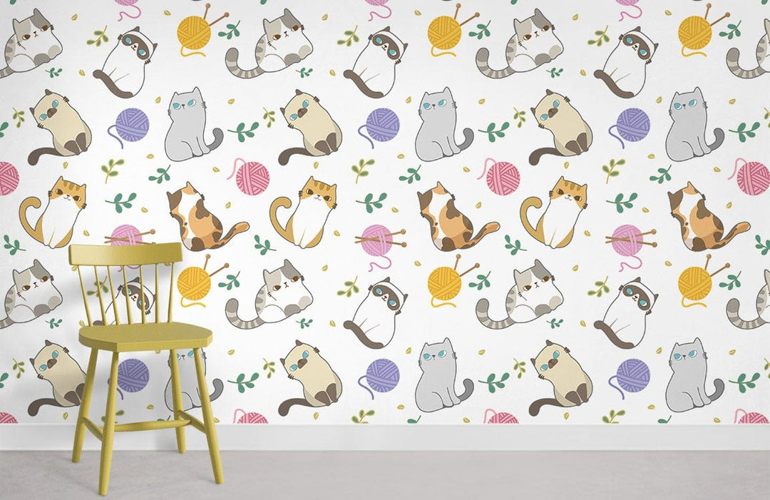 Playful pastel cat wallpaper, whimsical feline design in living room with yellow chair, grey flooring.