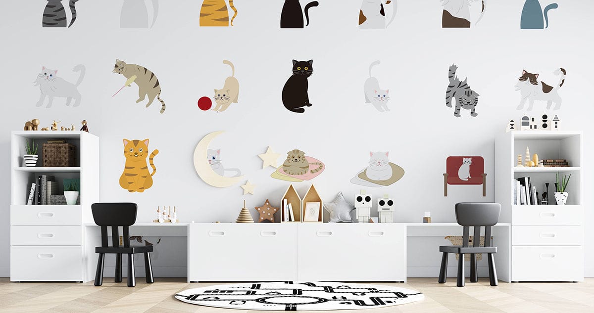 Charming Feline Friends wallpaper in pastel tones, black chairs, white cabinets, wooden flooring, children's room.