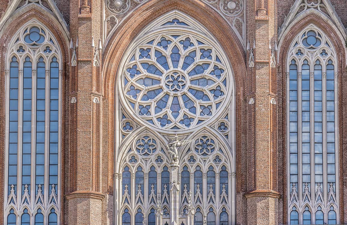 Elegant Gothic Architecture Wallpaper in Earthy Browns and Soft Greys