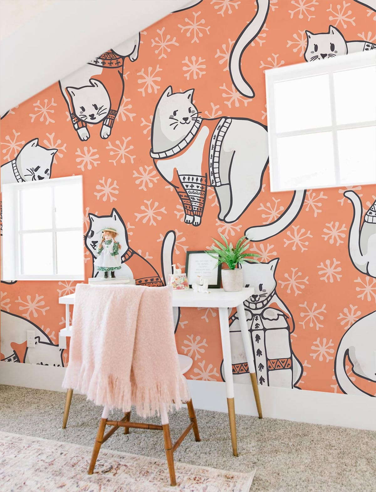 Cosy Cats Orange Sweater Pattern Wallpaper Mural in playful room with cosy desk and neutral flooring.