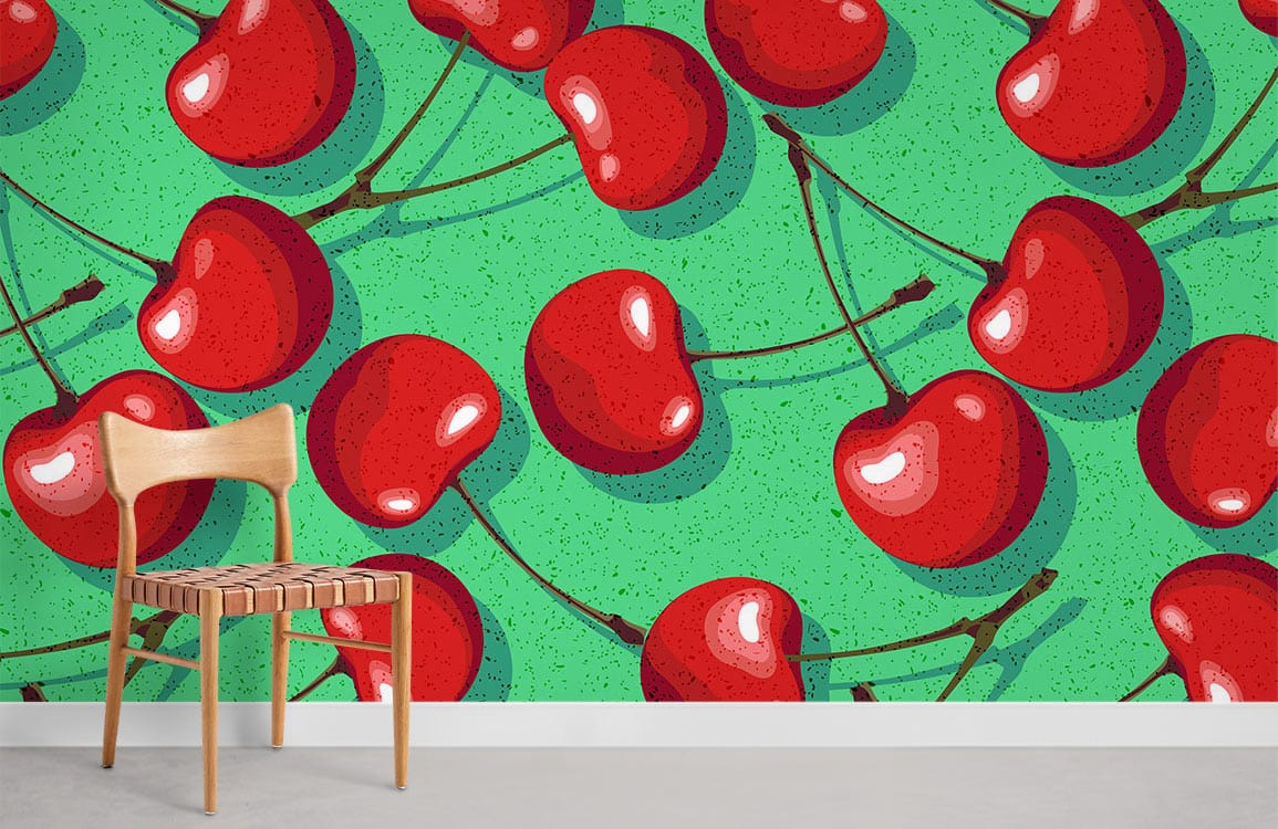 Retro red cherry patterned wallpaper with vibrant green background, simple wooden chair on grey flooring.
