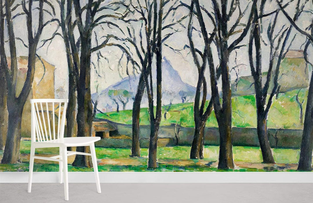 Vintage landscape mural wallpaper, leafless trees, mountain scene; white chair; minimalist room; grey flooring.