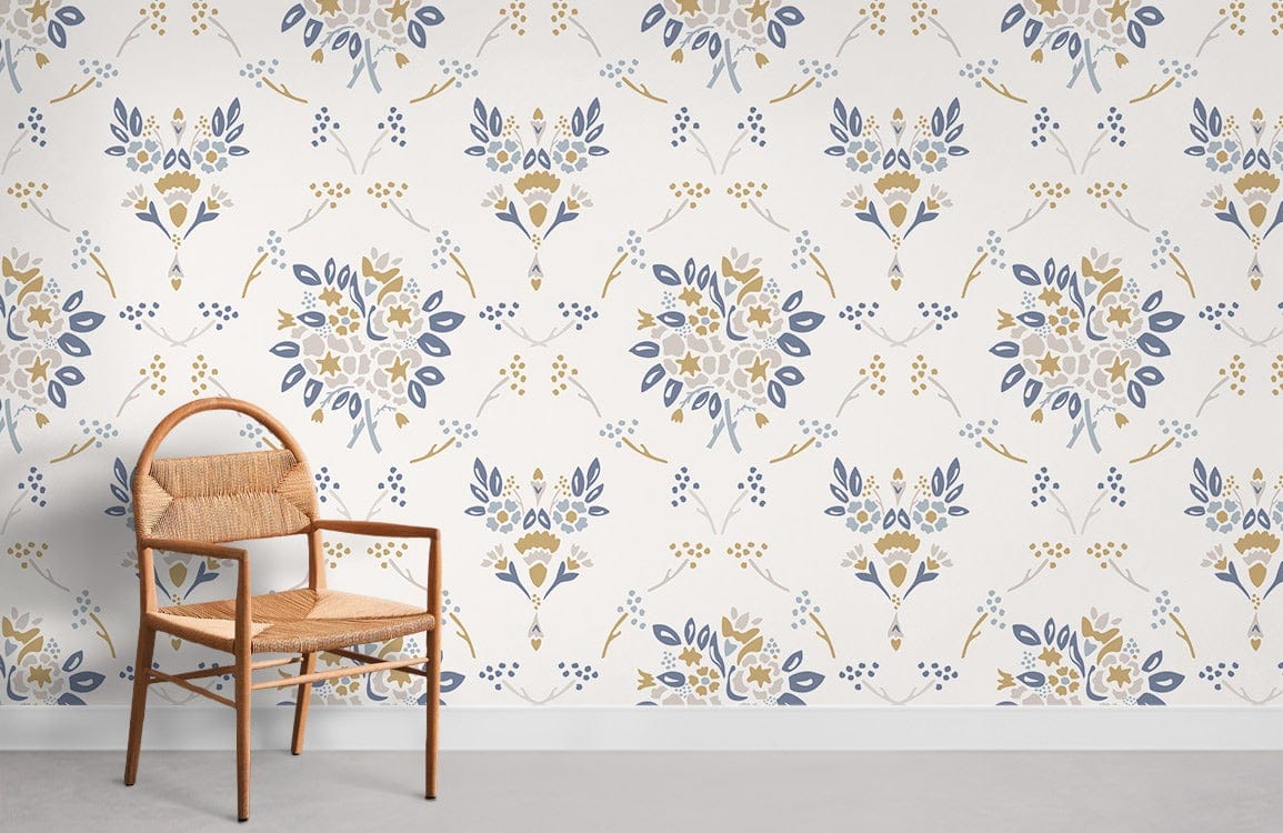 Vintage floral wallpaper in blue and gold tones, featuring a wooden chair on grey flooring.