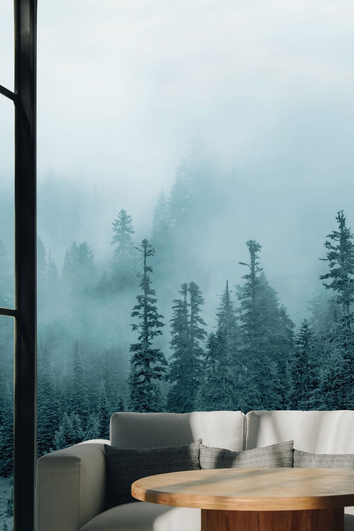 Misty Forest Green Landscape Mural Wallpaper, modern living room with beige sofa, wooden coffee table.